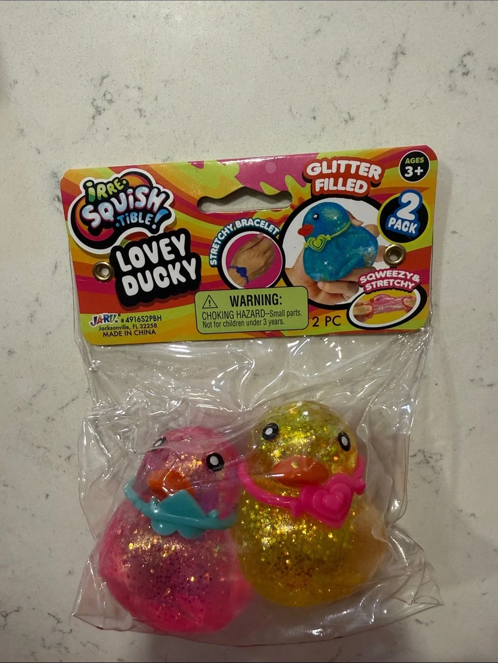 Brand New 2026 Ja-Ru Irre-Squish-Tible Lovey Ducky 2-Pack - Pink & Yellow